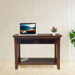 Wooden desk with a laptop on a light wooden floor and white wall background