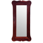 A rectangular wooden frame decorative wall mirror with a carved design on the frame's border.