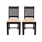 Two solid wood dining chairs with a walnut finish and beige upholstered seats, viewed from a slight angle.