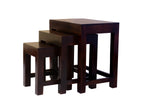 A set of three wooden nesting tables in walnut finish, with the largest table on the bottom and the smallest on top, all with a square shape.