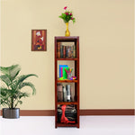 A wooden open bookshelf in a living room setting, with books, decorative items, and plants.