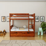 Wooden bunk bed with white bedding in a room with decor elements.