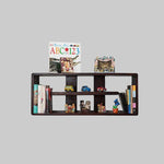 A walnut-finished mango wood bookcase table with multiple shelves, displaying books, decorative items, and photo frames.