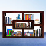 A solid wood open bookshelf in walnut finish, with multiple shelves holding books, decorative items and other objects.