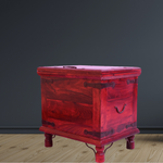 Red wooden chest on a dark gray background