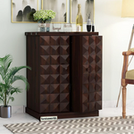 A walnut-finished wooden bar cabinet with a geometric diamond pattern design, featuring a drawer and bottle holders, placed in a living room setting.