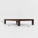 Wooden coffee table with dimensions labeled on a white background