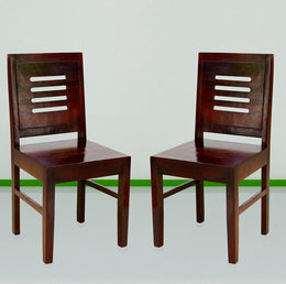 Two solid wood dining chairs with a maple finish, featuring a high-back design and padded seat.