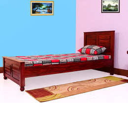 A single bed made of solid wood with a mahogany finish, featuring a headboard, footboard, and a mattress on a bed frame, placed in a room with two picture frames on the wall.