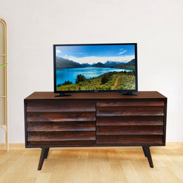 Mango wood TV cabinet with 2 doors in a walnut finish, with a flat-screen TV on top.