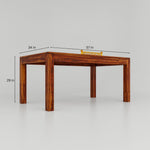 Wooden table with dimensions marked on a gray background