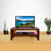 A wooden TV cabinet in a natural finish, with a flat-screen TV on top, flanked by two vases, with a plant and stuffed toys as decorative items.