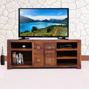 Wooden TV unit with storage space, in a brown finish, with a flat-screen TV on top displaying a nature scene.
