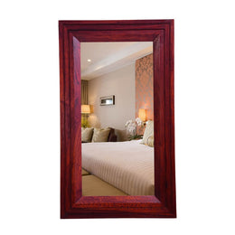 Rectangular rosewood maple finish mirror for bedroom or bathroom decor, displayed in an interior setting