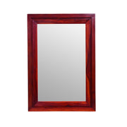 Rectangular wooden frame decorative wall mirror, with a clear mirror in the center, set against a plain background.