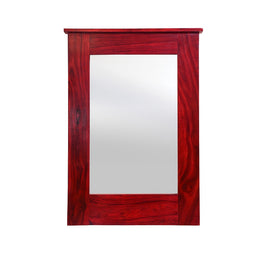 A rectangular red wood framed decorative wall mirror with a white mirror surface, isolated on a white background.