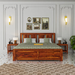 Wooden bed with green bedding in a bedroom setting