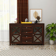 Wooden sideboard with glass panels in a room with decor elements.