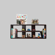 A walnut-finished mango wood bookcase table with multiple shelves, displaying books, decorative items, and photo frames.