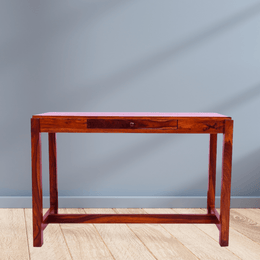 Wooden console table against a gray wall