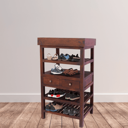 Wooden shoe rack with multiple shelves and drawers against a plain wall.