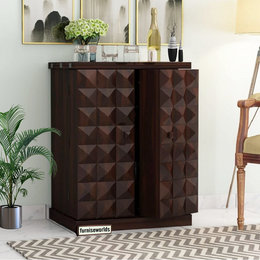 A walnut-finished wooden bar cabinet with a geometric diamond pattern design, featuring a drawer and bottle holders, placed in a living room setting.