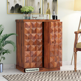 A honey finish wooden bar cabinet with a contemporary style, featuring a diamond-shaped pattern on the front, placed in a living room setting.